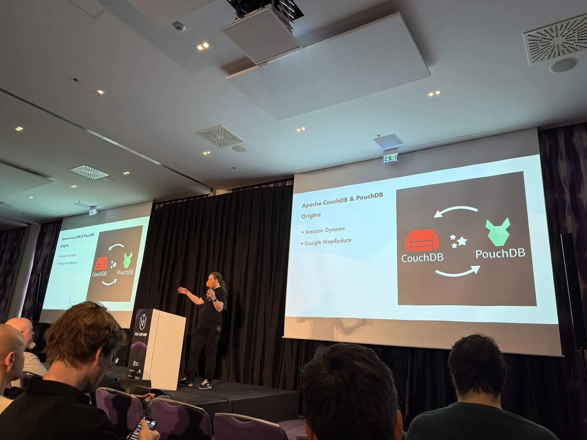 Jan Lehnardt was the first speak of day 2, and we see him presenting alongside a large projection with the CouchDB and PouchDB logos